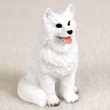 Koncepti razgovora američka eskimo minijaturna figurica psa